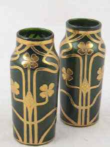 Appraisal: A pair of sparkle green glass vases c overlaid with