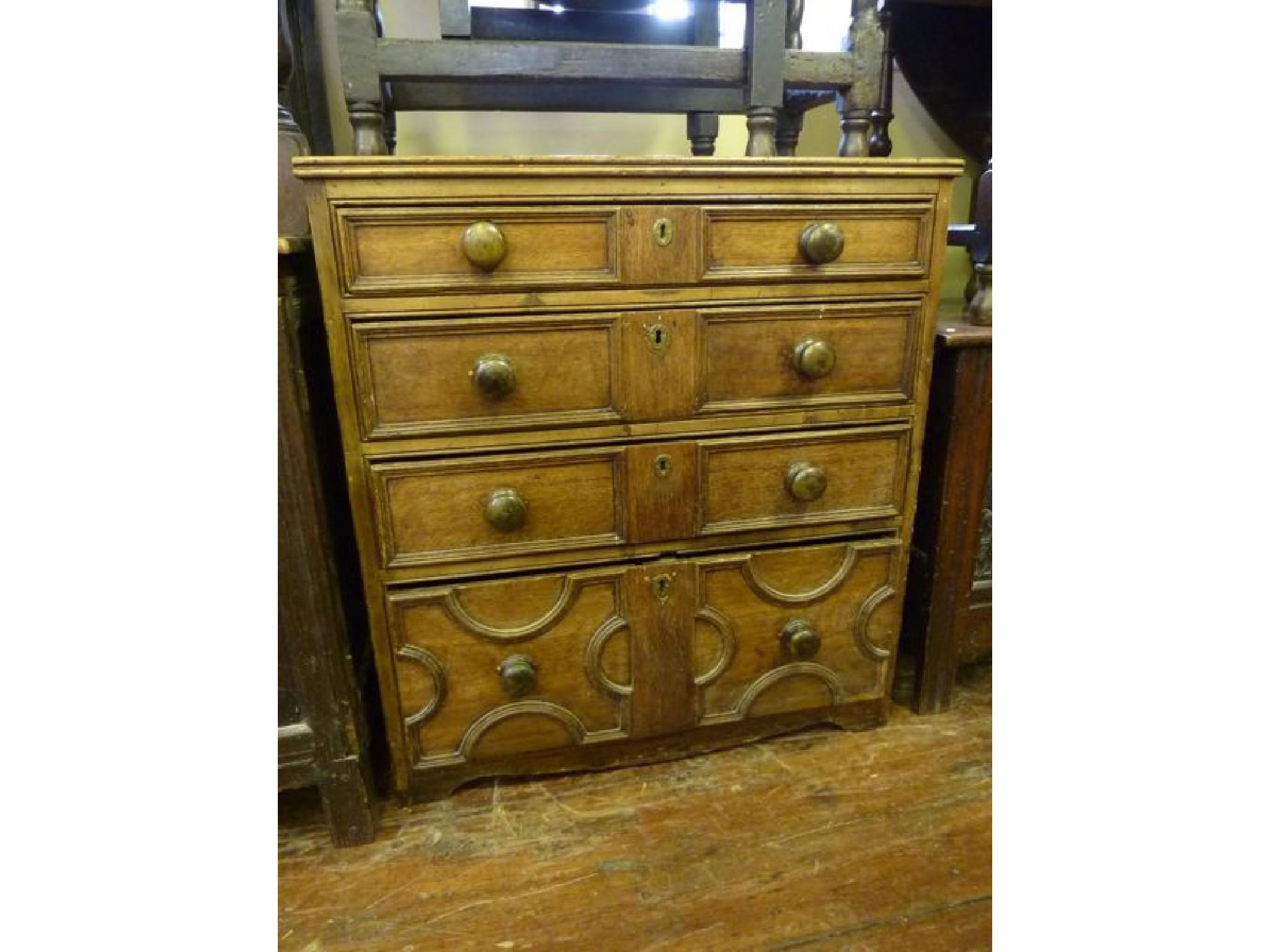 Appraisal: A Georgian oak and pine constructed chest fitted with an