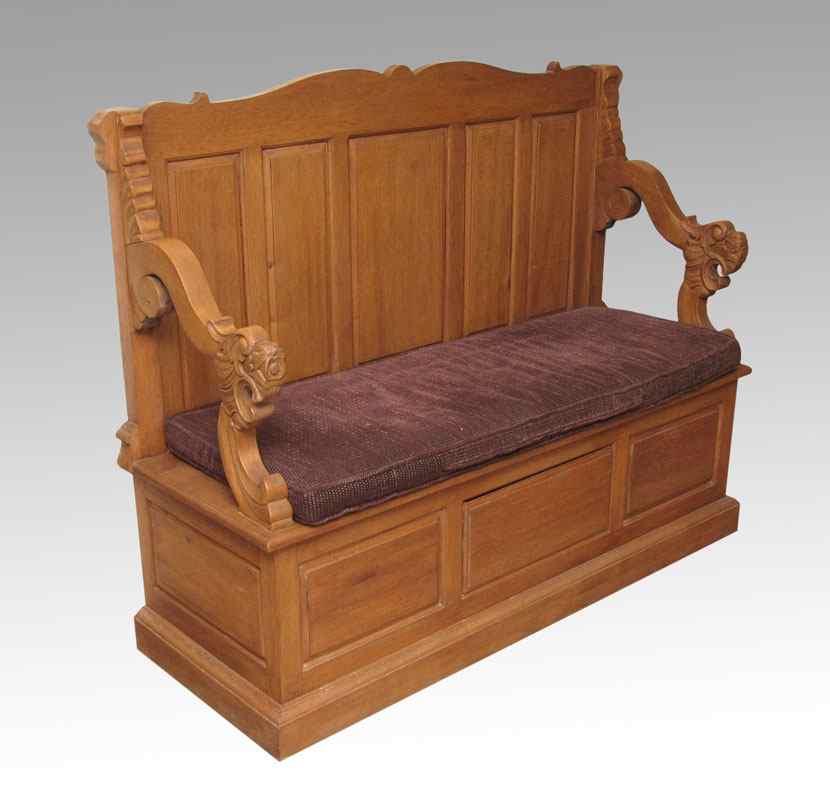 Appraisal: GOLDEN OAK BENCH WITH CARVED LION ARMS High back bench