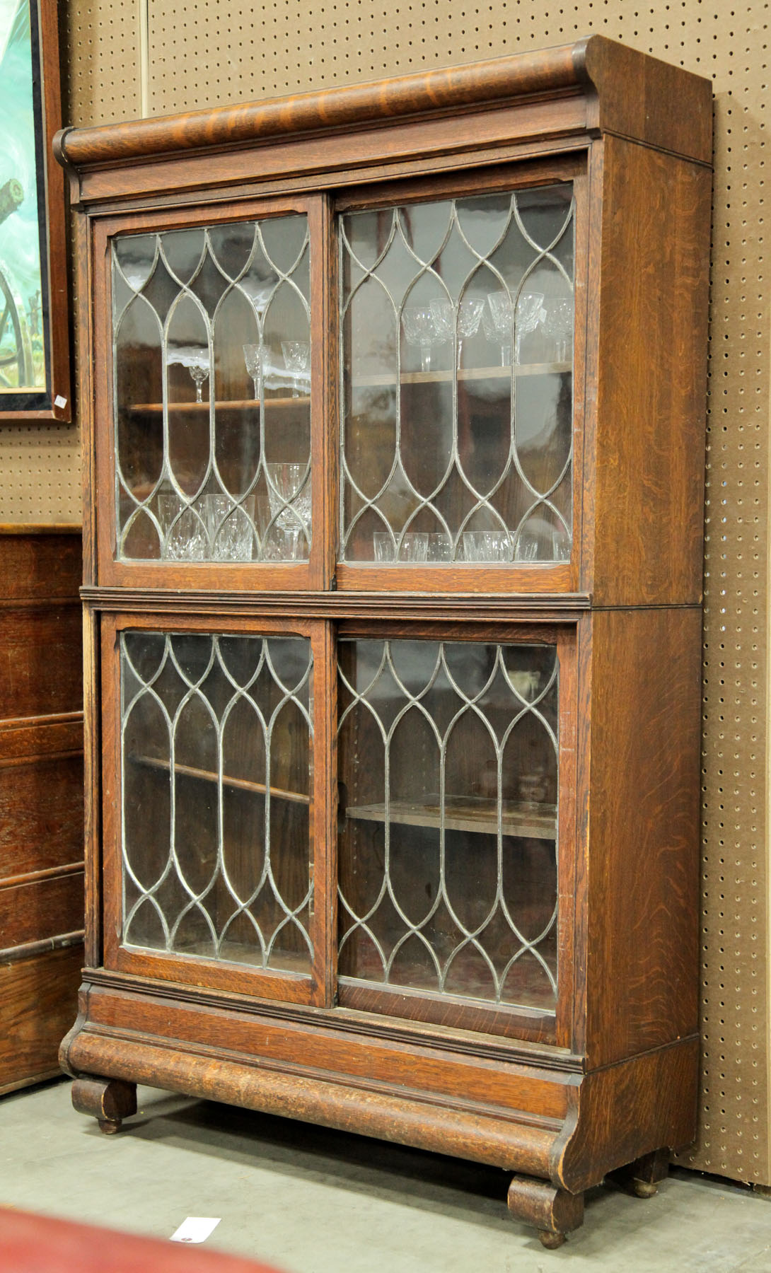 Appraisal: LEADED DOOR BOOKCASE American early th century oak Four part