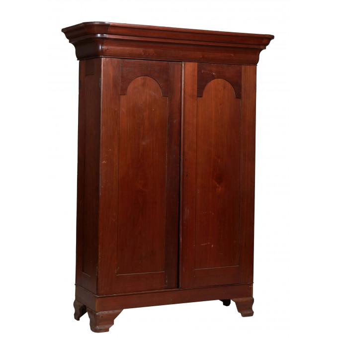 Appraisal: American Carved Walnut Armoire th c the stepped rounded corner