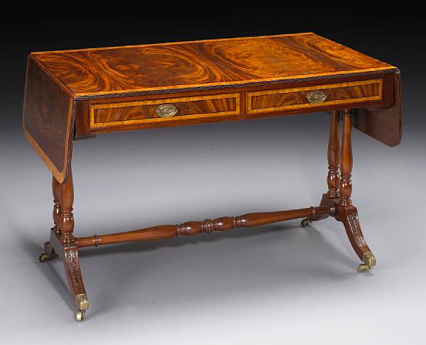 Appraisal: A Regency inlaid mahogany sofa table early th century The