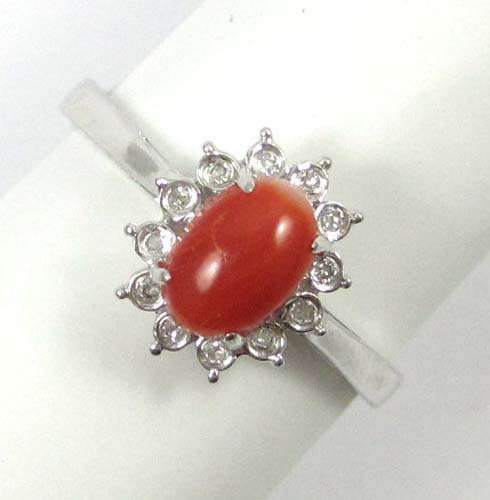 Appraisal: RED CORAL DIAMOND AND WHITE GOLD RING The k gold