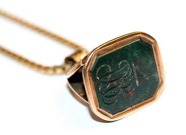 Appraisal: A GOLD FOB SEAL set with a bloodstone in a