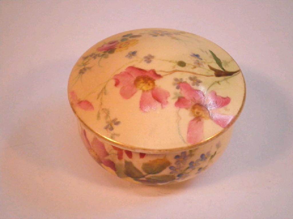 Appraisal: A Royal Worcester blush ivory porcelain box and cover decorated