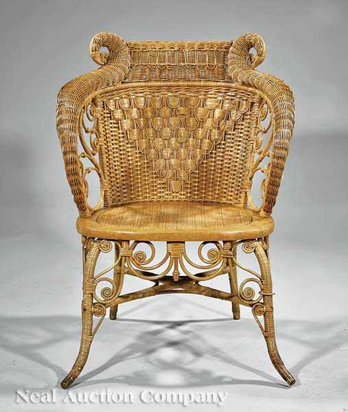 Appraisal: An American Wicker and Cane Armchair late th c intricately