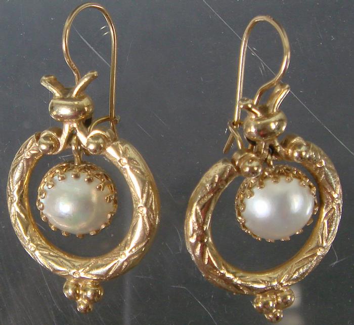 Appraisal: K yg Mabe' pearl earrings chased circular form with center