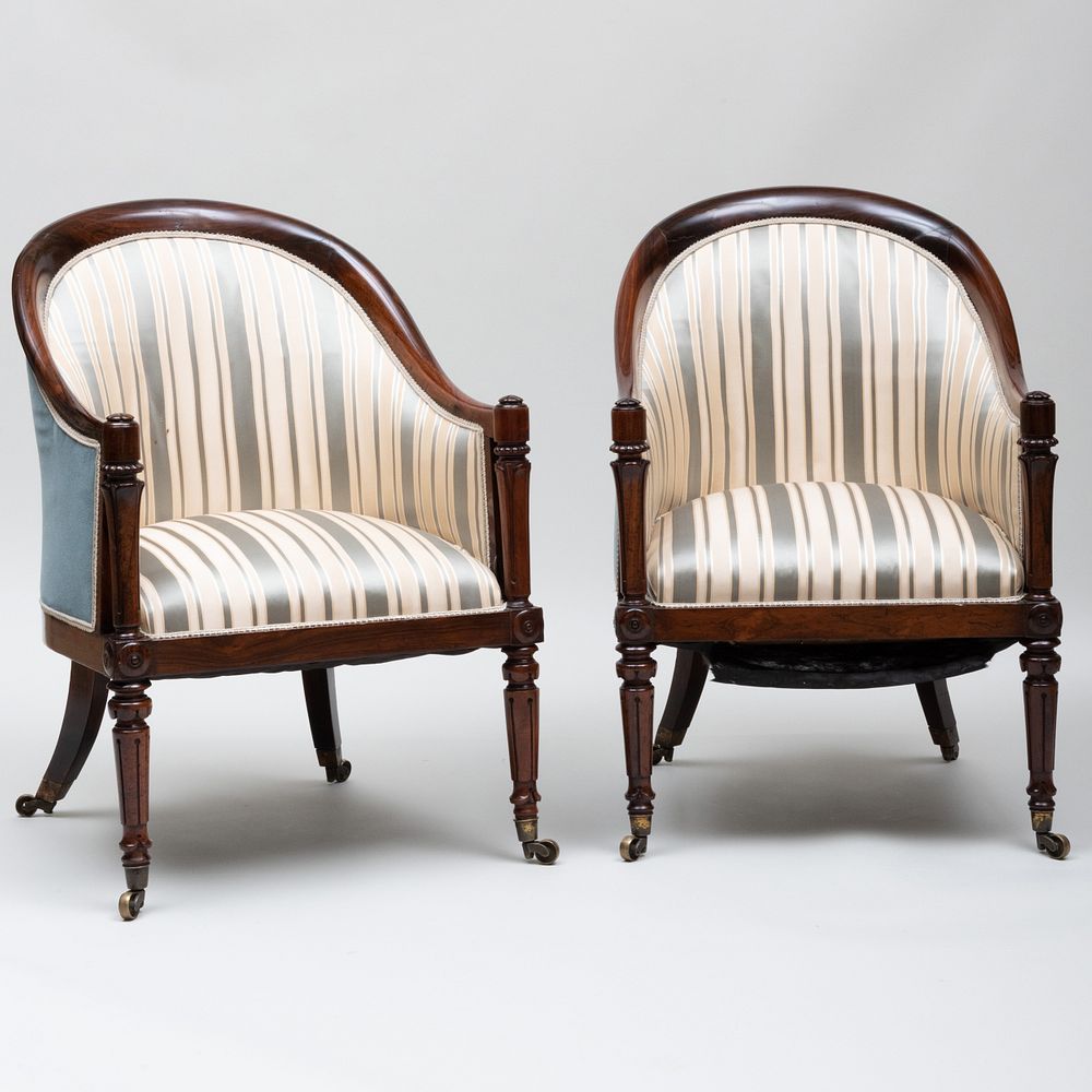 Appraisal: Pair of Regency Carved Rosewood Armchairs Raised on casters x