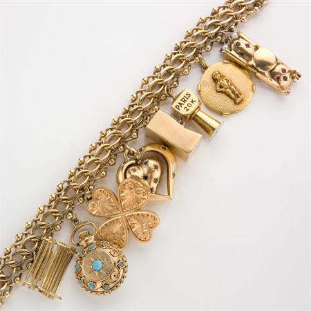 Appraisal: Gold Charm Bracelet and Three Charms Estimate -