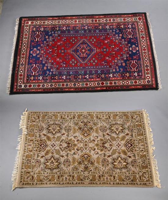 Appraisal: TWO ORIENTAL RUGS Indo-Persian floral in shades of grey and