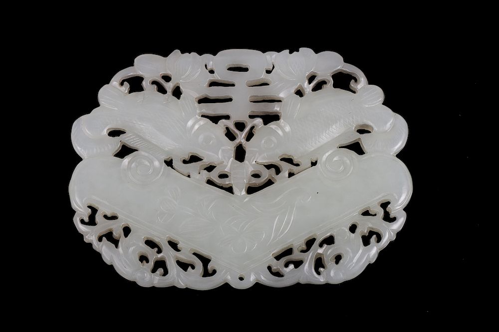 Appraisal: CHINESE WHITE JADE 'FISH' PLAQUE An openwork carved plaque in