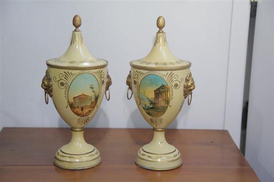 Appraisal: PAIR OF FRENCH TOLE DECORATED URNS Pale yellow urns with