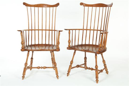 Appraisal: PAIR OF WINDSOR-STYLE COMB-BACK ARMCHAIRS American nd half- th century