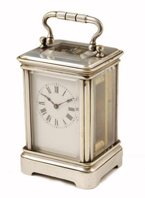 Appraisal: A French miniature plated corniche cased carriage clock by Henri