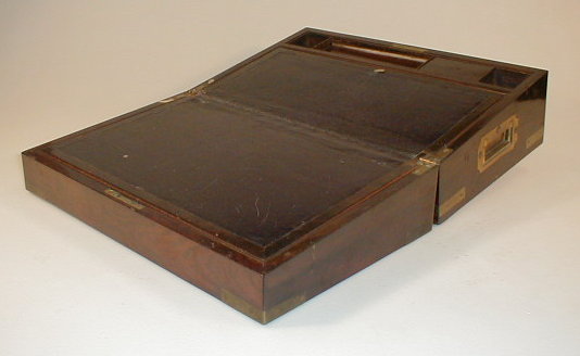 Appraisal: A Victorian rosewood campaign duet writing box with fitted interior