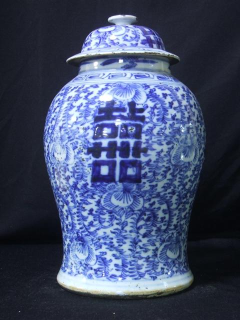 Appraisal: CHINESE BLUE AND WHITE BALUSTER VASE Decorated with scrolling flowers