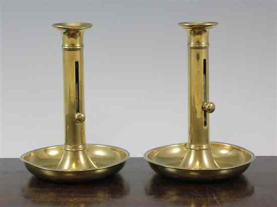 Appraisal: A pair of brass chamber candlesticks c with long stems