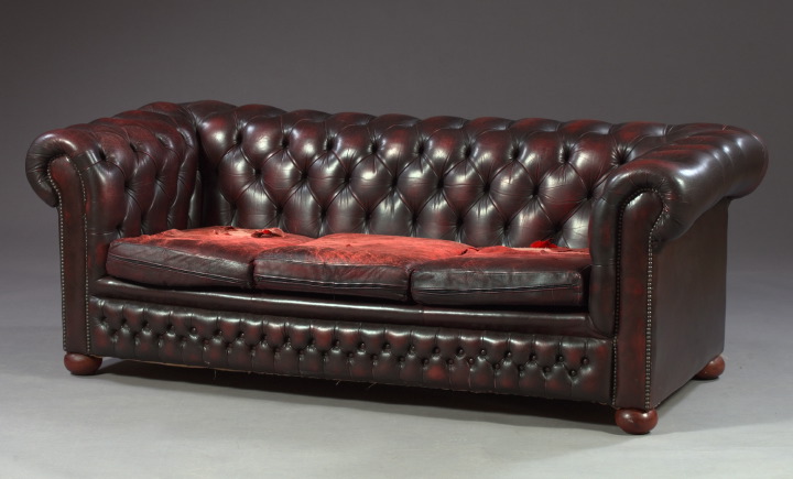 Appraisal: Victorian-Style Tufted Oxblood Leather Upholstered Sofa of box form the