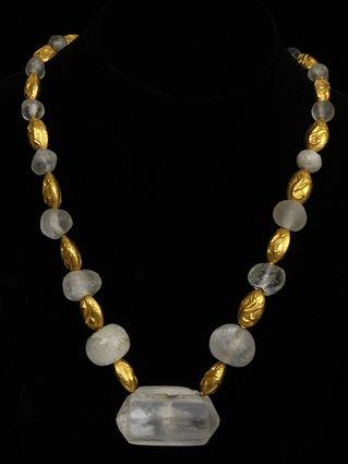 Appraisal: EARLY PERSIAN ROCK CRYSTAL AND HOLLOW-GOLD BEAD NECKLACE in Provenance