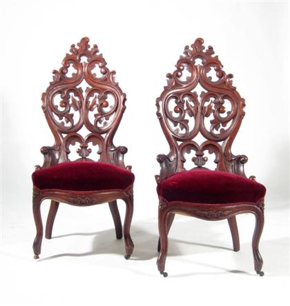 Appraisal: Pair of rosewood Gothic Revival chairs circa The elaborately carved