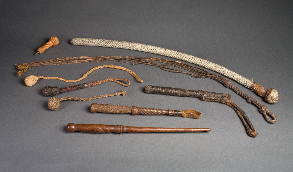 Appraisal: ROPE AND IRON CUDGEL Consisting of an iron bar covered