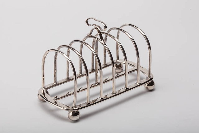 Appraisal: AN EARLY TH CENTURY SILVER SIX DIVISION SILVER TOAST RACK