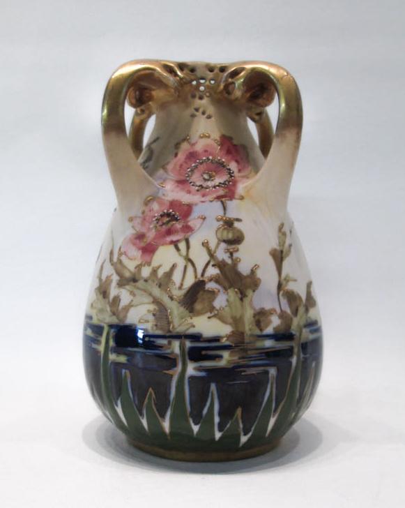 Appraisal: AMPHORA PORCELAIN VASE pear form with four handles hand enameled