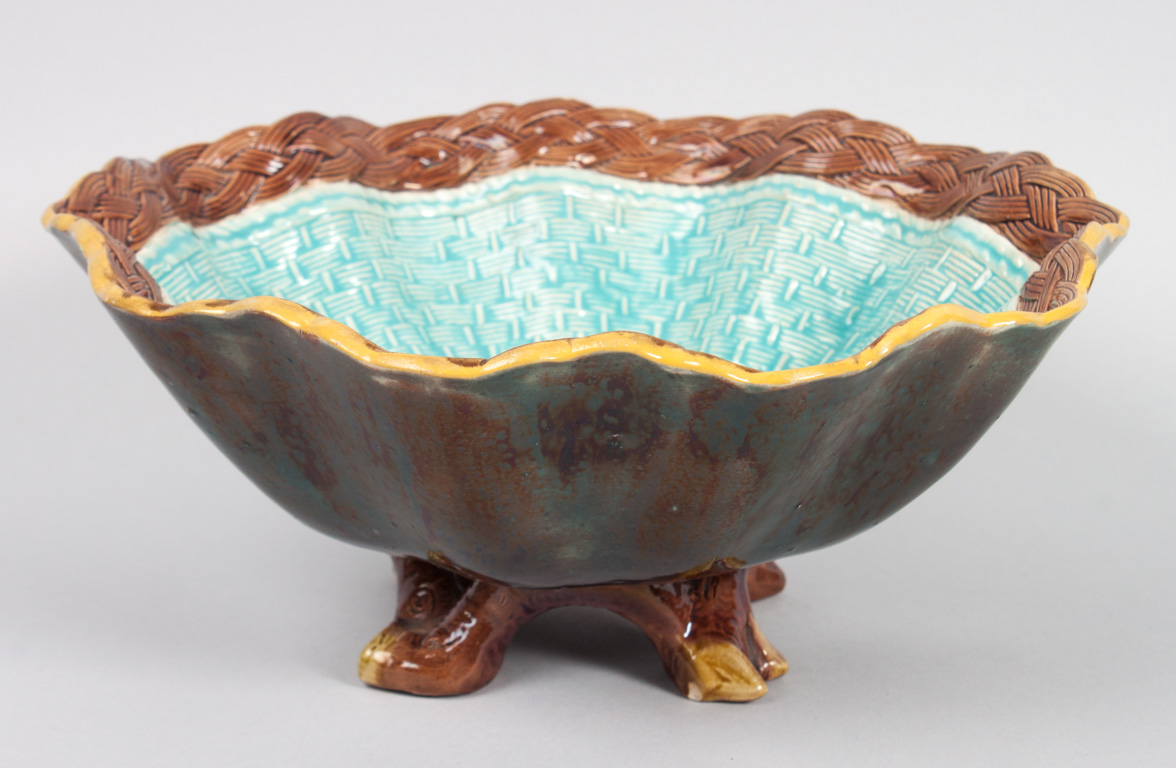 Appraisal: Joseph Holdcroft majolica footed bowl late th century shell-form bowl