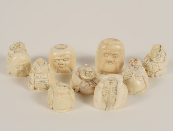 Appraisal: Lot of carved bone tooth Japanese Netsuke All inscribed Tallest