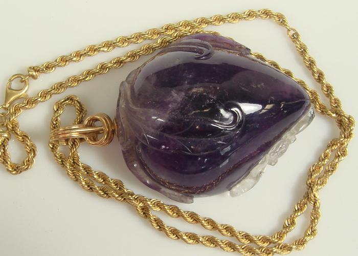 Appraisal: K yg Chain with Carved Amethyst Fruit Large amethyst carving