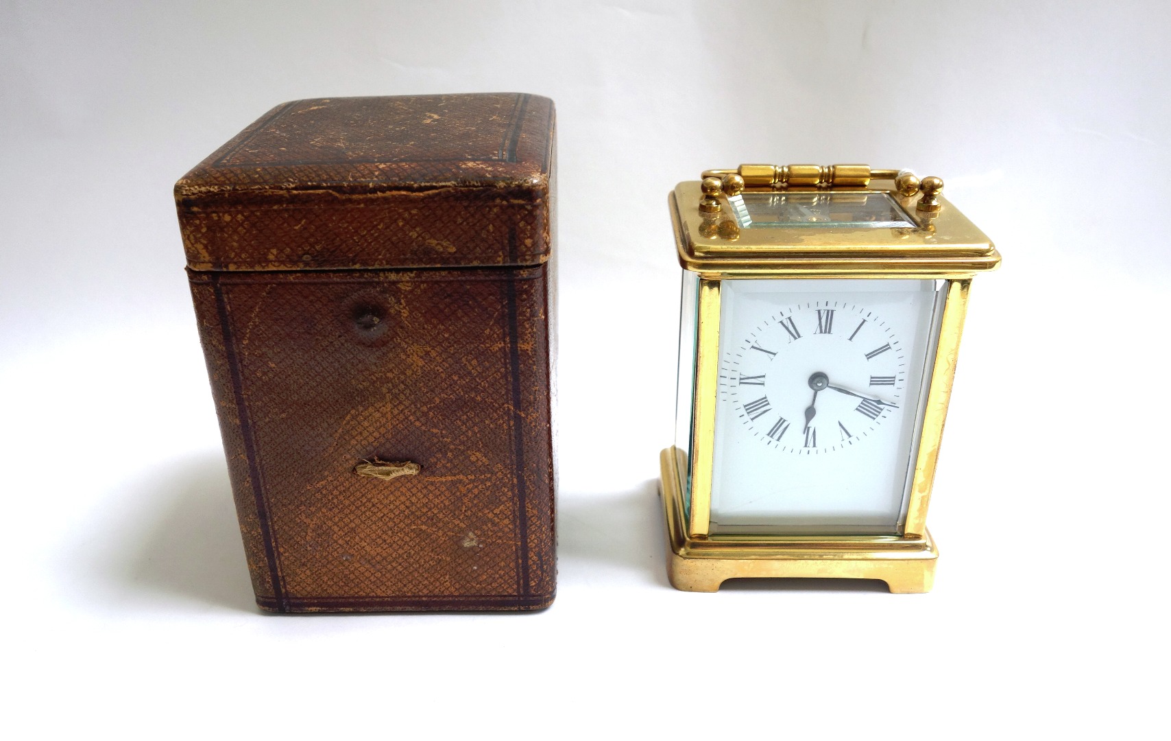 Appraisal: A th century French brass cased carriage clock with white