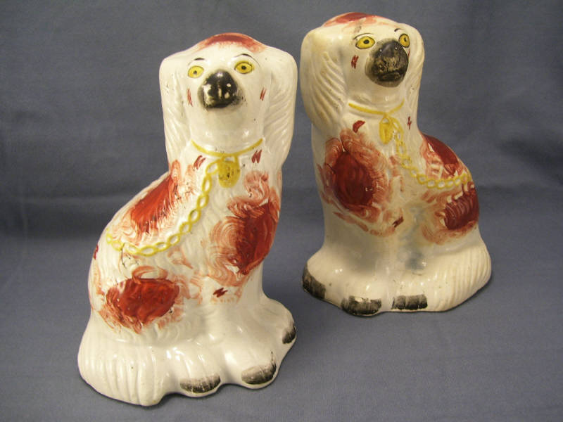 Appraisal: Pair Staffordshire Comforter Spaniels Red and white spaniels with gold