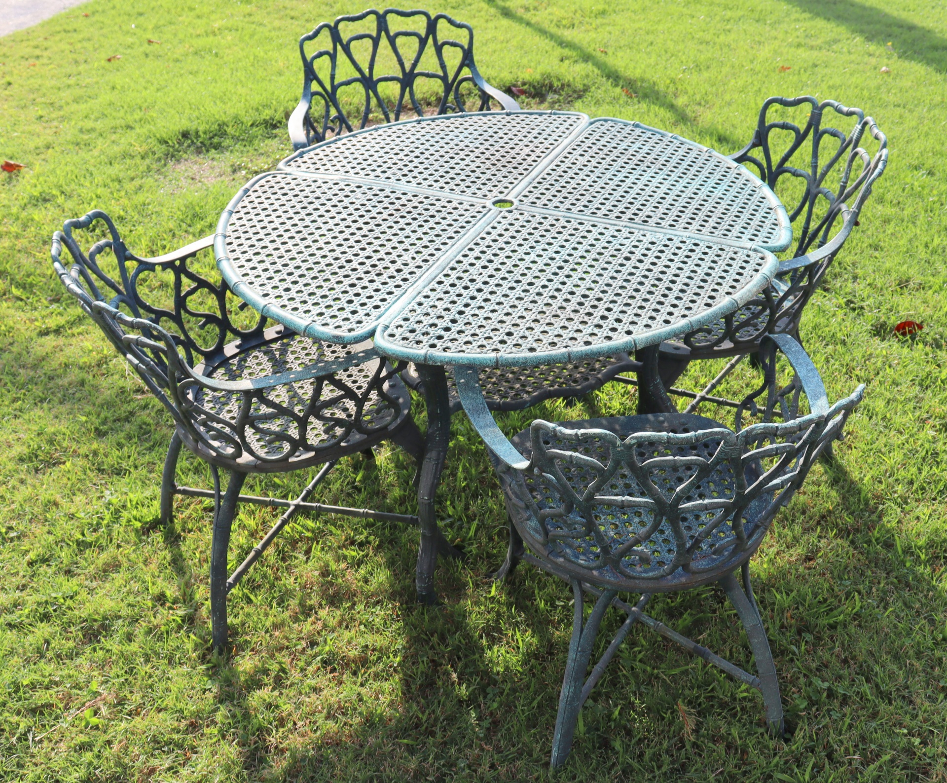 Appraisal: VINTAGE PATINATED IRON TABLE CHAIRS Good quality and heavy Nice