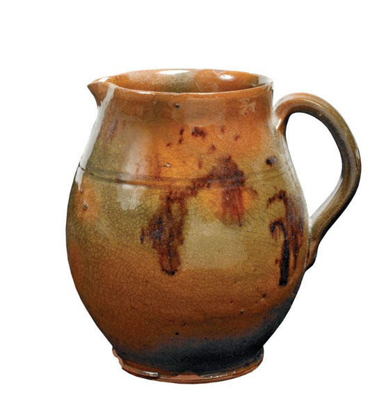 Appraisal: NEW ENGLAND REDWARE PITCHER With maganese decoration Height frac inches