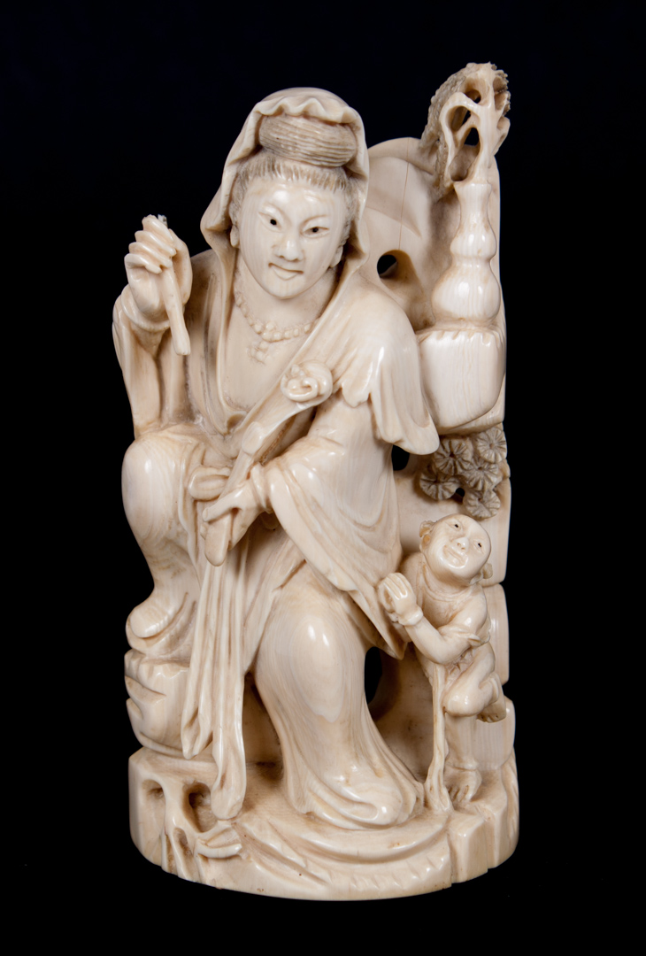 Appraisal: Chinese carved ivory figural group modeled as woman holding Ruyi