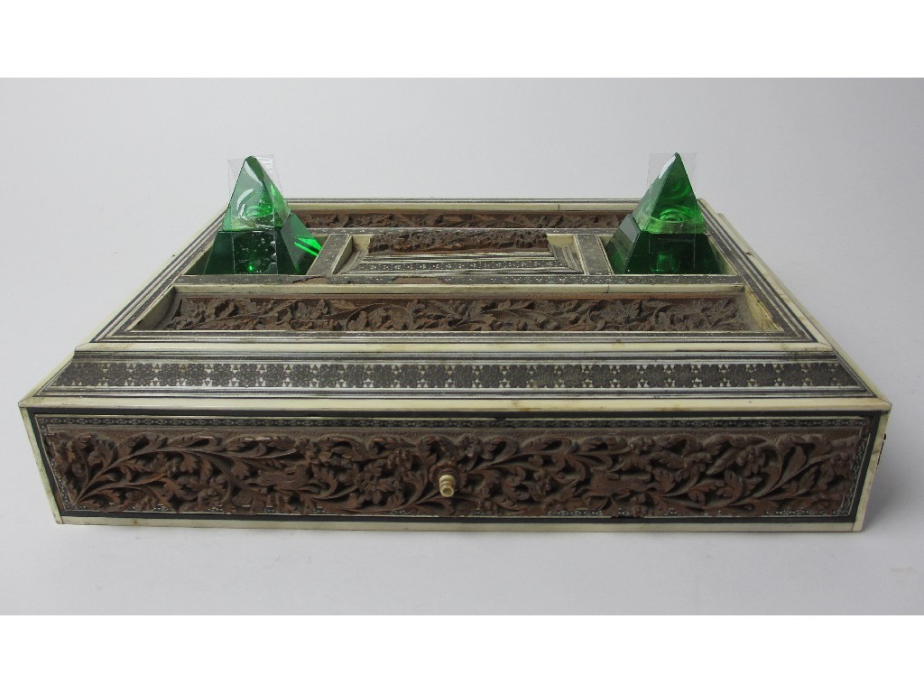 Appraisal: A Sadeli inkstand with a pair of pyramid glass wells