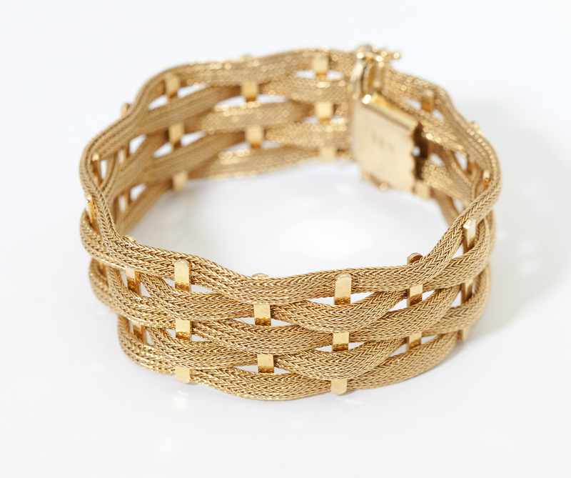 Appraisal: A gold five-row woven bracelet K gold length '' gms