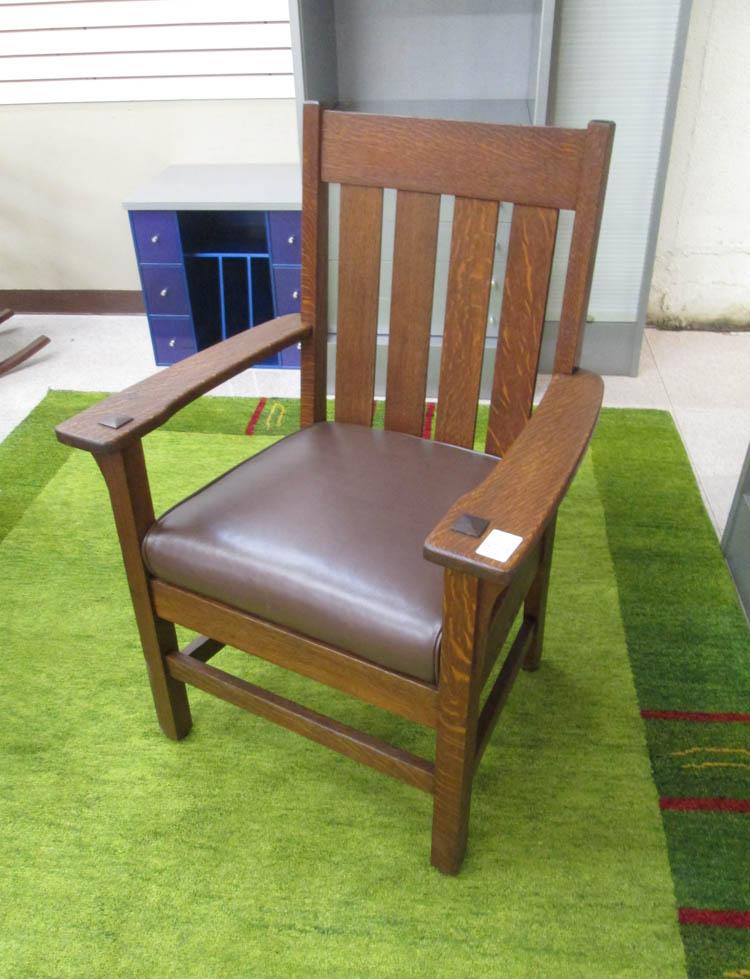 Appraisal: CRAFTSMAN OAK ARMCHAIR American th century the back having four