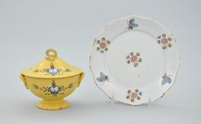 Appraisal: Faience Lidded Bowl and a Faience Plate The lot consisting