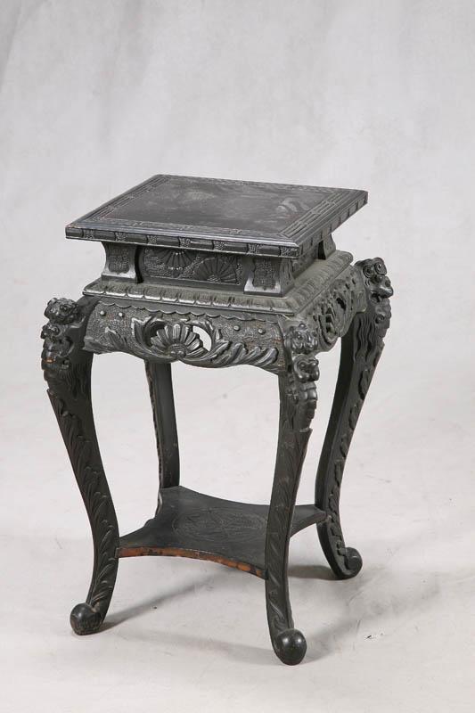 Appraisal: FERN STAND Oriental style stand with carved sunflower decoration h