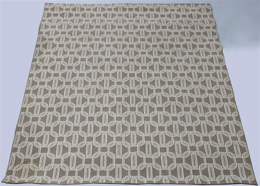 Appraisal: CONTEMPORARY MACHINE MADE TAN AND OFF-WHITE ABSTRACT RUG an interlacing