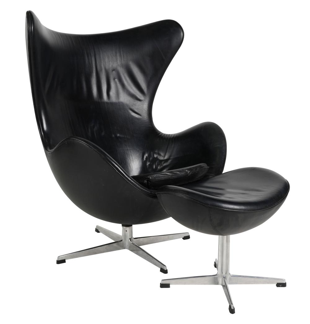 Appraisal: STYLE OF ARNE JACOBSEN EGG CHAIR OTTOMANblack leather aluminum and