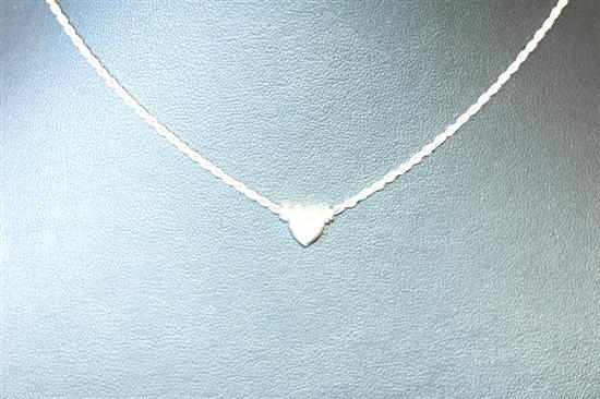 Appraisal: A DIAMOND PENDANT SET WITH HEART CUT DIAMOND WEIGHING APPROXIMATELY