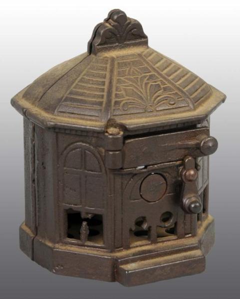 Appraisal: Cast Iron Octagonal Building Mechanical Bank Description Working Condition Excellent