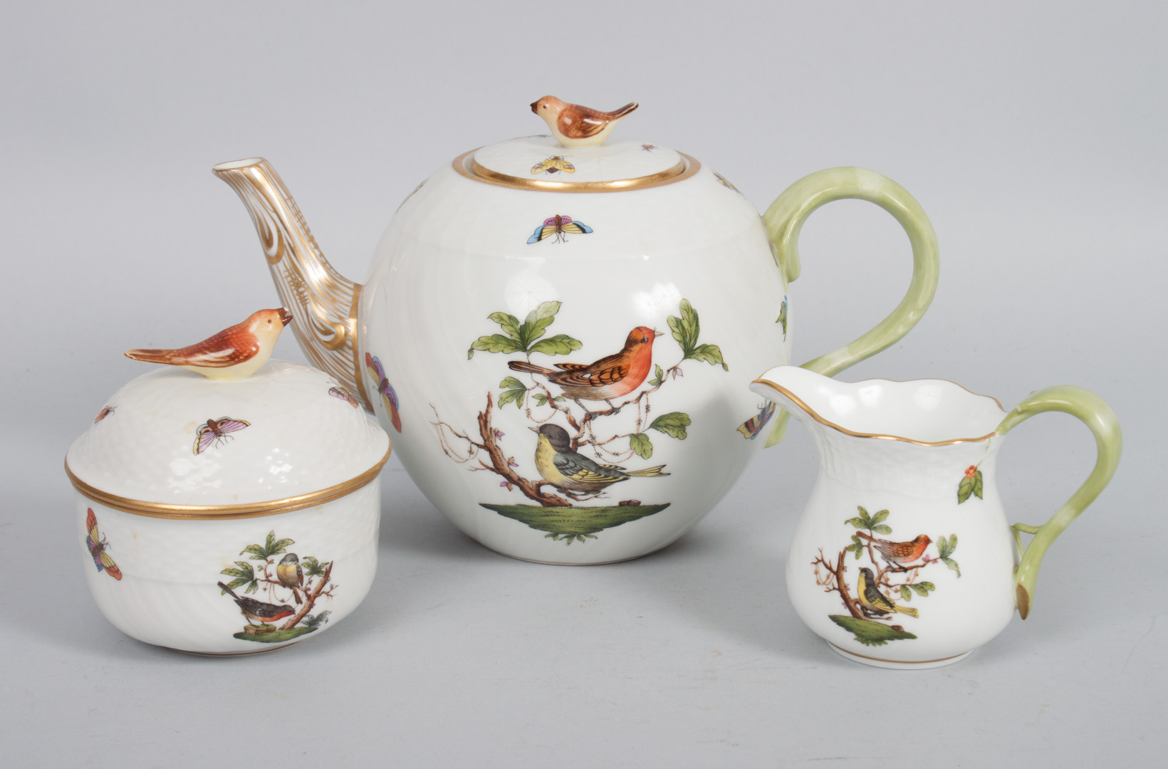 Appraisal: Herend porcelain three-piece tea set in the Rothschild Bird pattern