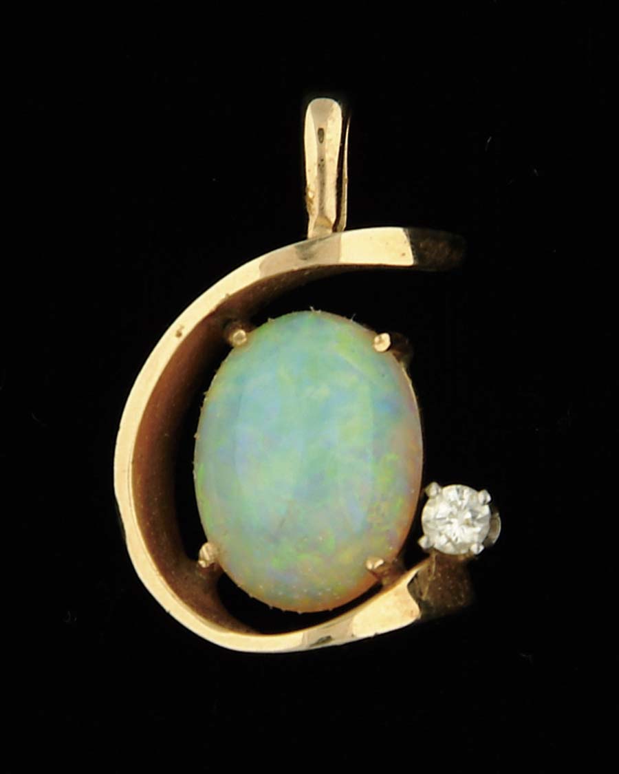 Appraisal: OPAL DIAMOND AND YELLOW GOLD PENDANT Custom made C-shaped setting