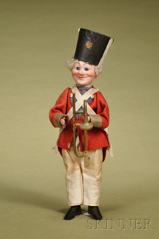 Appraisal: German Character Bandsman Squeak Toy c bisque flange head with