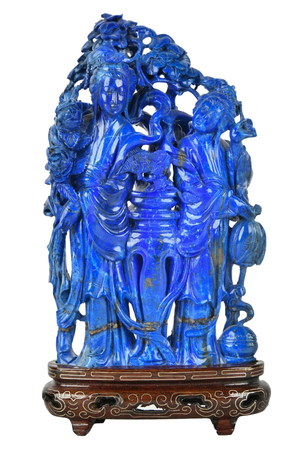 Appraisal: LAPIS FIGURAL GROUPattached to wood stand with putty total inches