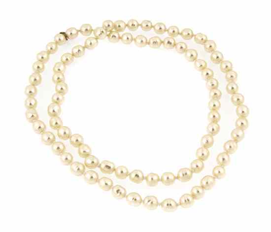 Appraisal: A Chanel Cream Faux Baroque Pearl Rope Necklace Stamped Chanel