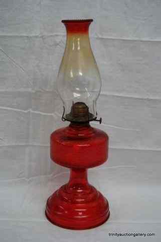 Appraisal: Vintage Red Flashed Pressed Glass Oil LampFrom the estate is